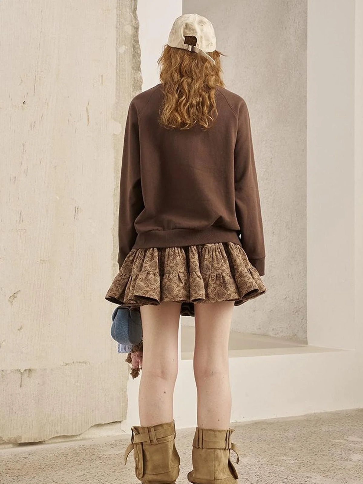 Blindfold Pup Canele Sweatshirt