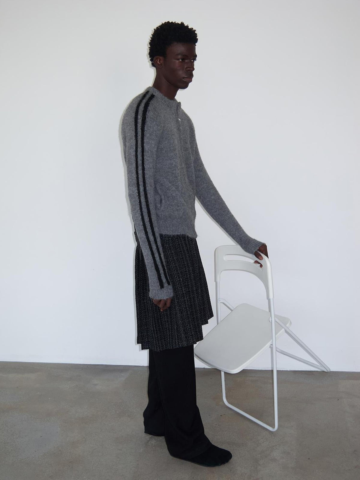 Zip Front Ribbed Sweater In Gray And Black Stripe